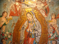Another closeup of Mexican tinwork nicho showing closeup of Our Lady of Guadalupe