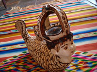 Another view of pottery mermaid with crown