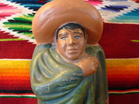 Closeup of face of  pottery bank