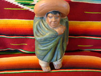 Mexican vintage pottery, bank in form of Mexican rancher, c. 1920.