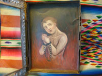 Closeup of retablo of soul in purgatoryl.