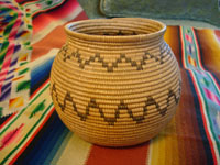 Native American basket, Chemehuevi olla with 2 bands of geometric zig zag lines, c. 1920.