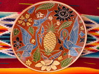 Mexican vintage pottery, Fantasia-style plate with central pineapple, Tlaquepaque, Jalisco, c. 1930.