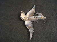 Photo of back of Navajo bird-pin, showing attachment.