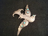 Native American jewelry, Navajo silver pin depicting a bird in flight, c. 1940.