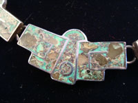 Closeup photo of Mexican necklace and earrings set.