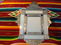 Another photo of Mexican tinwork mirror.