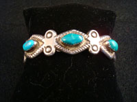Native American silver jewelry, Navajo silver bracelet with three turquoise stones, c. 1930.