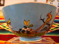 Mexican vintage pottery, Tlaquepaque bowl, closeup photo of side designs, floral with peasant and bird.