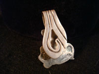 Mexican silver money clip, closeup.