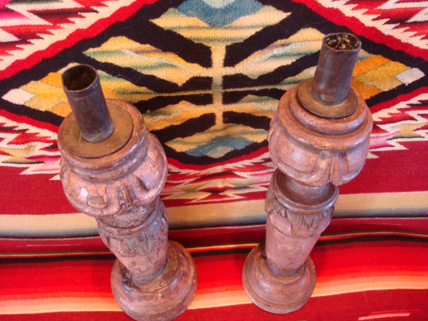 Mexican antique woodcarving, a pair of wooden candleholders, c. early