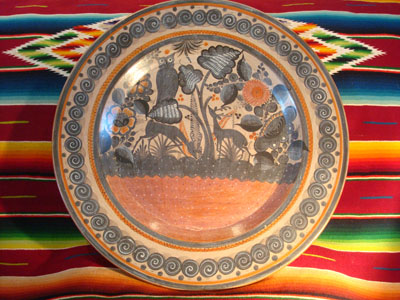 Mexican vintage pottery and ceramics, a beautiful burnished charger from Tonala, c. 1940.