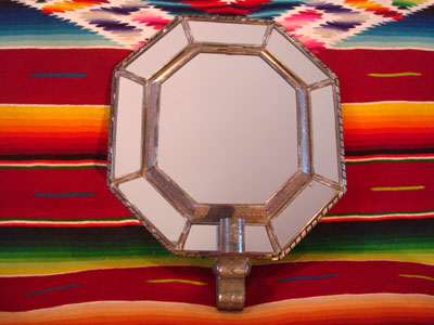 Mexican vintage tin art (tinwork art), an octagonal tinwork mirror with a single candleholder at the base, c. 1930-40.l 