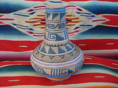 Mexican vintage pottery and ceramics, a flatware (opaco) water jar and cup from Tonala, Jalisco, c. 1930-40's. This piece is attributed to the famous L. Ortega of Tonala.  The jar and cup have a wonderful Aztec geometric design.