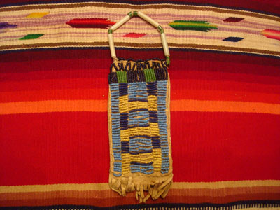 Native American Indian antique beadwork and folk-art, a Lakota (Sioux) beaded ration-pouch, c. 1890-1900.