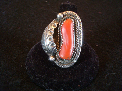 Native American Indian vintage sterling silver jewelry, a Navajo sterling silver ring with fine stamping and a lovely corral stone, c. 1950's.