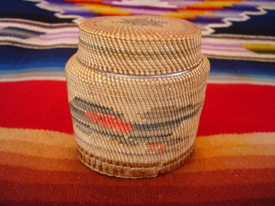 Native American Indian antique basket, a finely woven Northwest Coast basket, woven around a Pond's Cold Cream Jar and lid, Nootka or Makah Indians, c. 1920's.