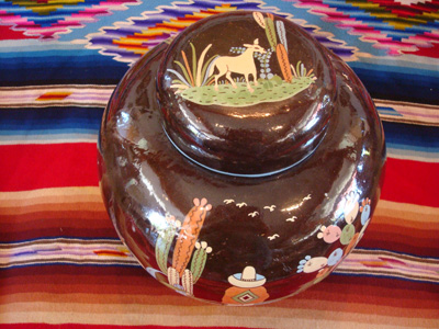 Mexican vintage pottery and ceramics, a large lidded black-ware tibor, Tlaquepaque, Jalisco, c. 1920's. The artwork of this piece is incredibly wonderful; this is a museum-quality piece of vintage Mexican pottery and a collector's dream!