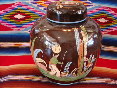 Mexican vintage pottery and ceramics, a large lidded black-ware tibor, Tlaquepaque, Jalisco, c. 1920's. The artwork of this piece is incredibly wonderful; this is a museum-quality piece of vintage Mexican pottery and a collector's dream!
