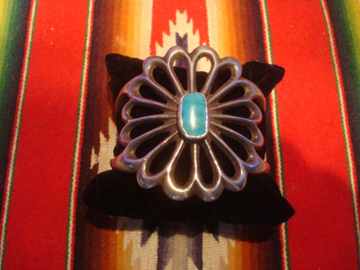 Native American Indian vintage sterling silver jewelry, and Navajo vintage sterling silver jewelry, a beautiful silver and turquoise sandcast bracelet with exceptional silverwork, Arizona or New Mexico, c. 1950's.